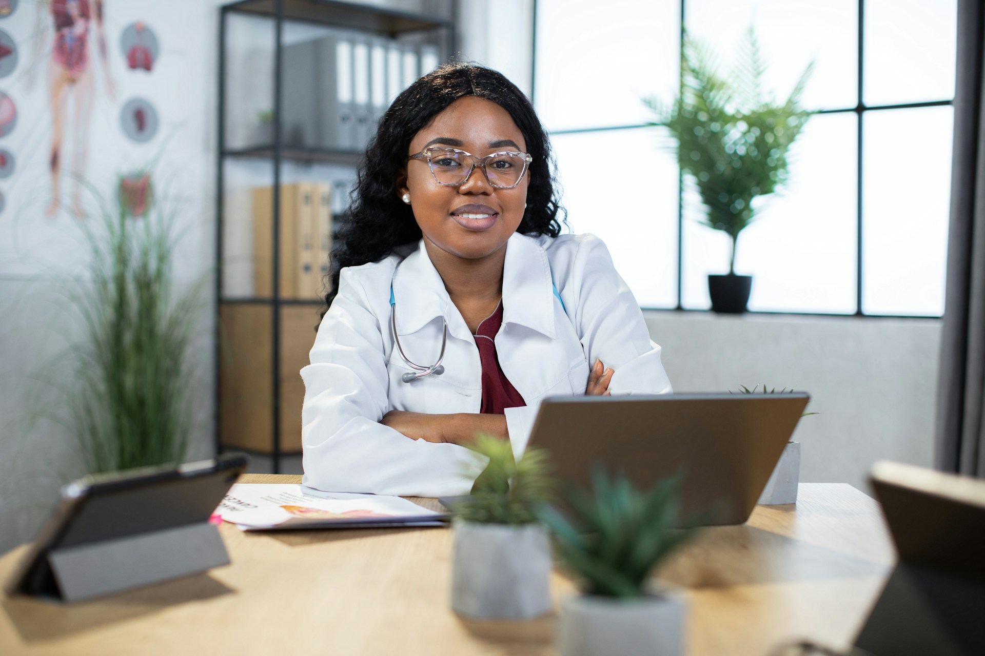 close-up-of-pretty-smiling-qualified-black-skinned-female-doctor